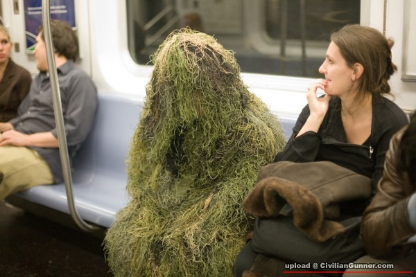 man-in-sniper-camouflage-on-subway-train-600x400.jpg